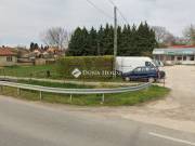 Eladó telek, Dány