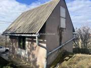 Eladó ház, Romonya