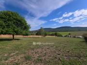 Eladó 6753 m2-es építési telek Üröm, Völgyliget lakópark felett / Budai út