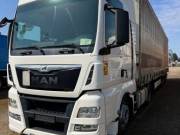 MAN TGX LL 18.440 nyergesvontató + függönyponyvás félpótkocsi